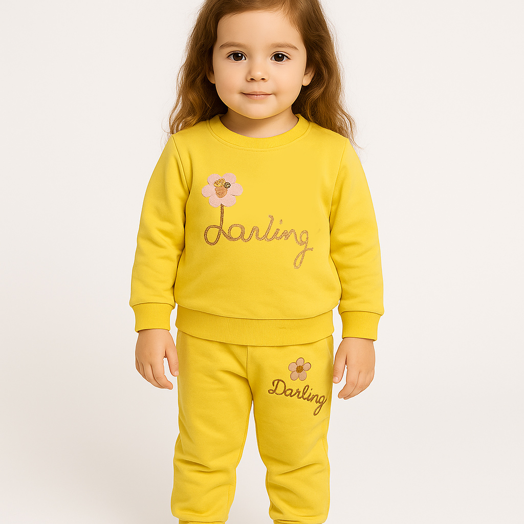 ست بلوز و شلوار دخترانه پاییزه رنگ زرد باگلدوزی و گل برجسته جنس دورس سایز 32 و 37 کد 1018